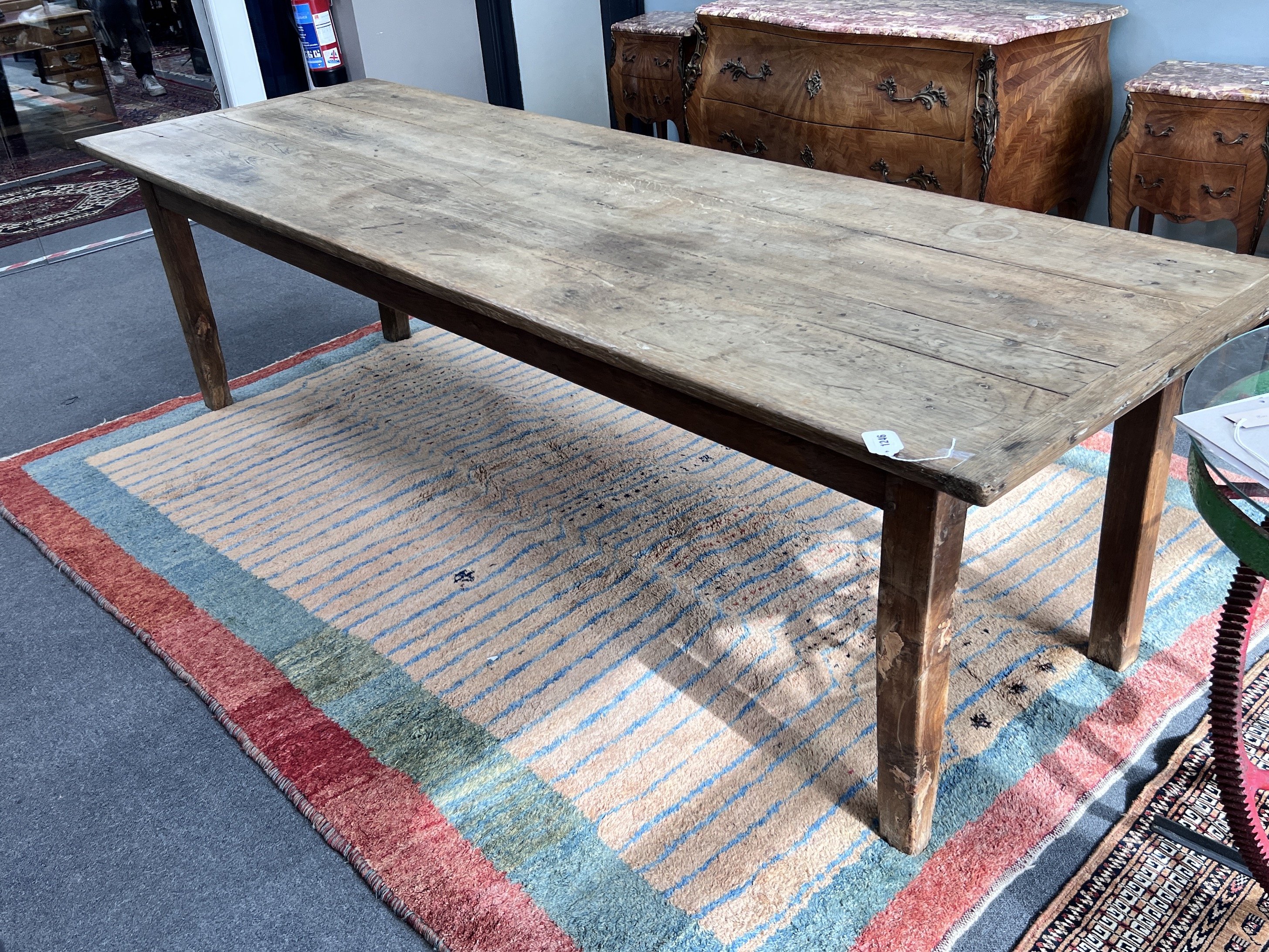 A 19th century French oak and fruitwood kitchen table with drawers each end, length 260cm, width 85cm, height 72cm